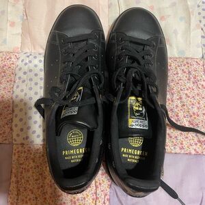 Adidas Black and Gold Athletic Shoes with Iconic Branding 8.5